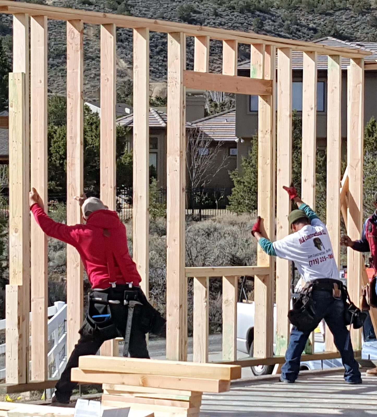 DLR crew raising garage walls, Mayberry area