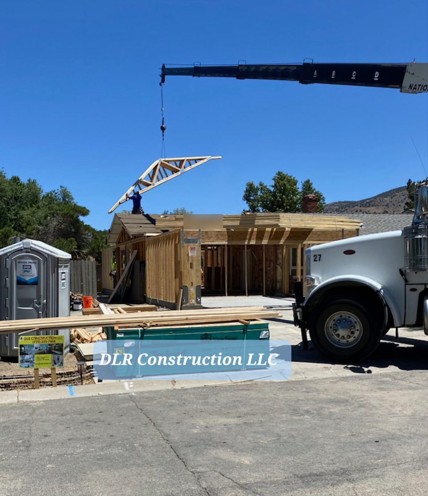 Crane setting roof trusses on the ADU, Virginia Highlands